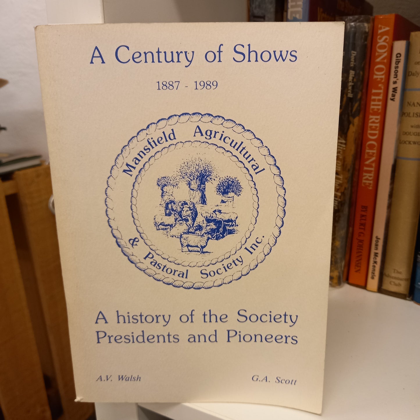 A Century of Shows 1887-1989: A History of the Society Presidents and Pioneers by A.V. Walsh & G.A. Scott – Mansfield Agricultural & Pastoral Society, c1989 – Softcover (Very Good Condition, Signed by G.A. Scott)-Australian History / Agricultural Societies-Tilbrook and Co