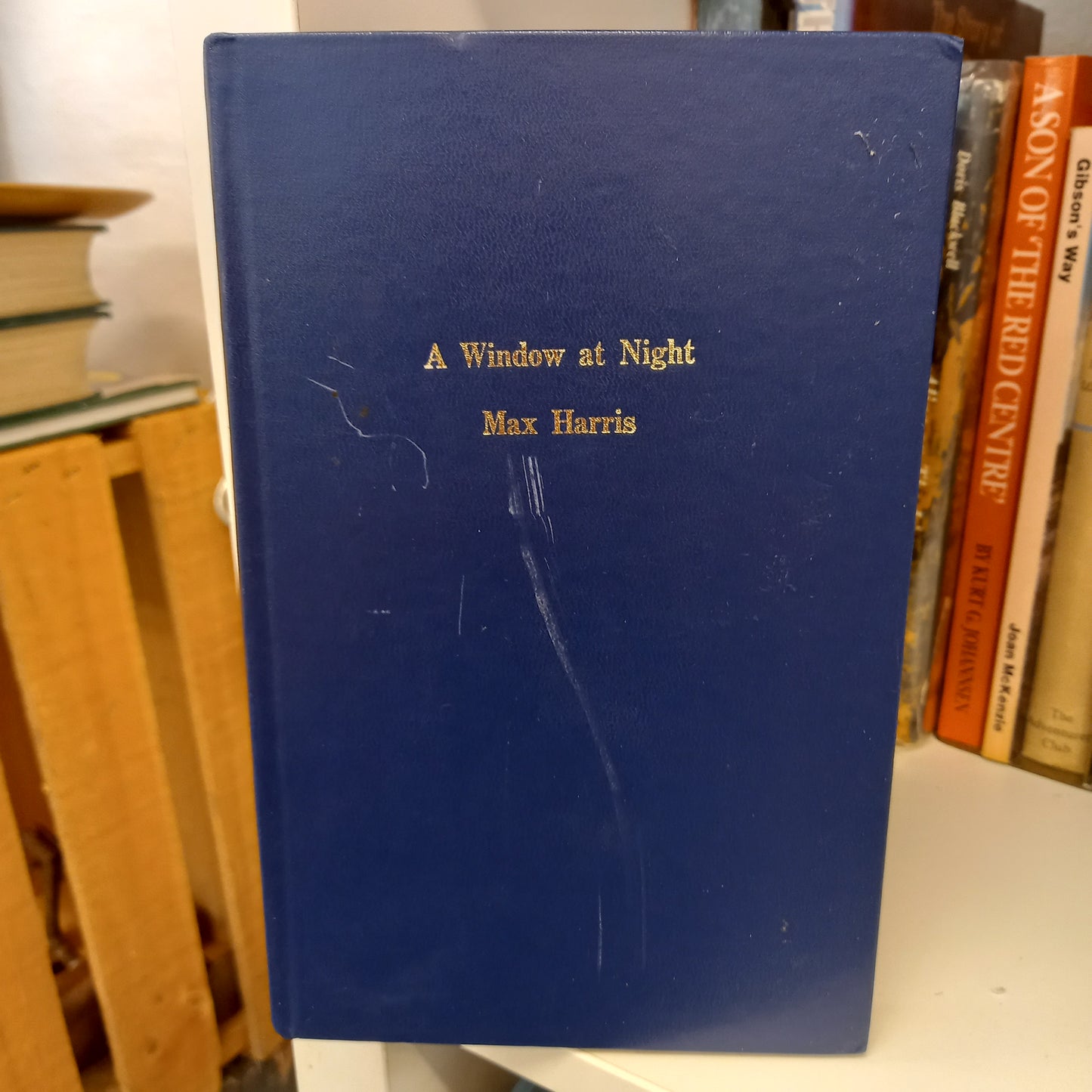 A window at night by Max Harris-Books-Tilbrook and Co