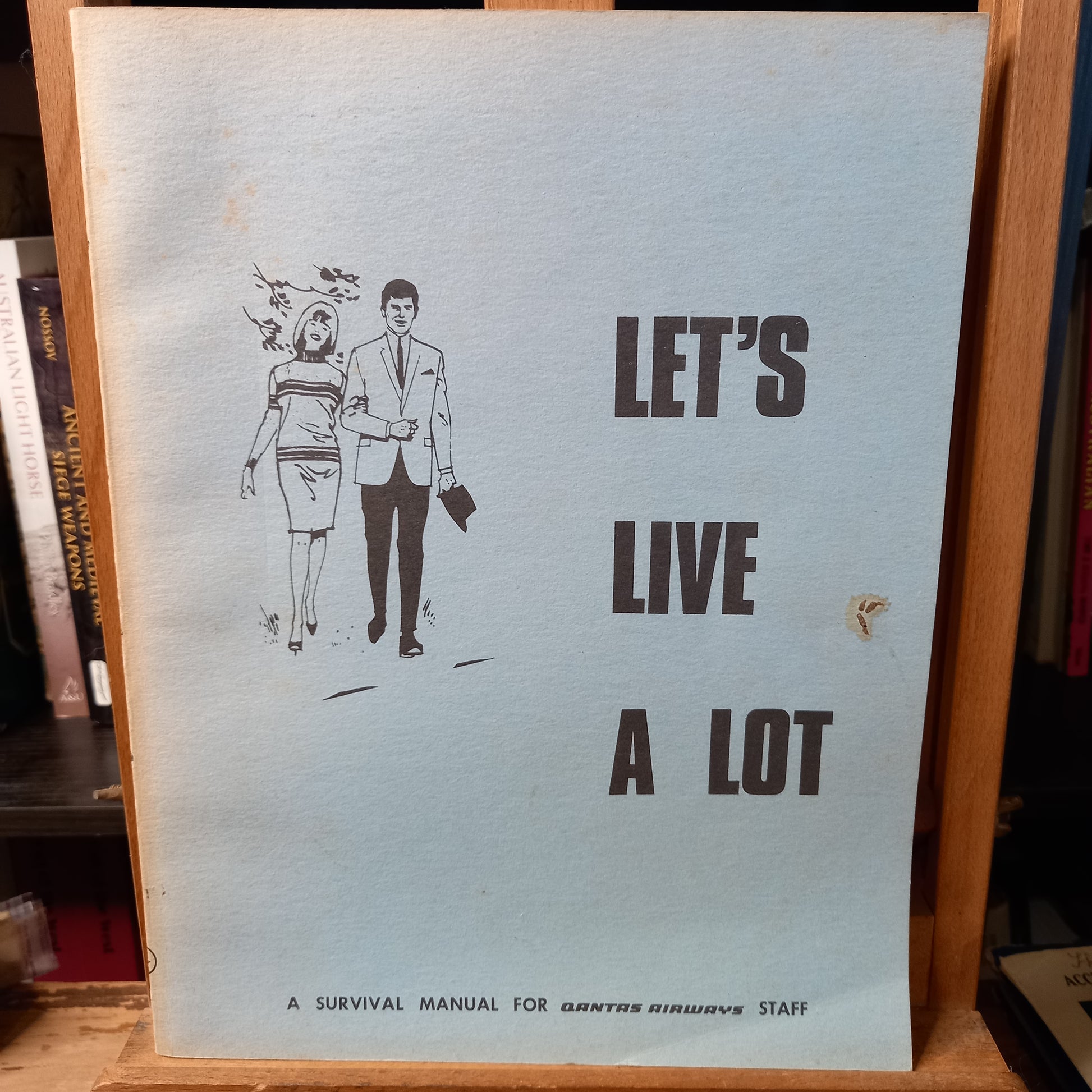 Let's Live a Lot: A Survival Manual for Qantas Airways Staff | Qantas In-House Publication (1975)-Corporate In-House Manual / Airline Culture & History-Tilbrook and Co