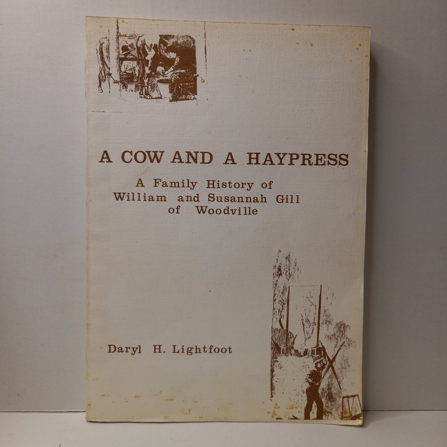 A cow and a haypress : a family history of William and Susannah Gill of Woodville by Daryl H. Lightfoot-Book-Tilbrook and Co