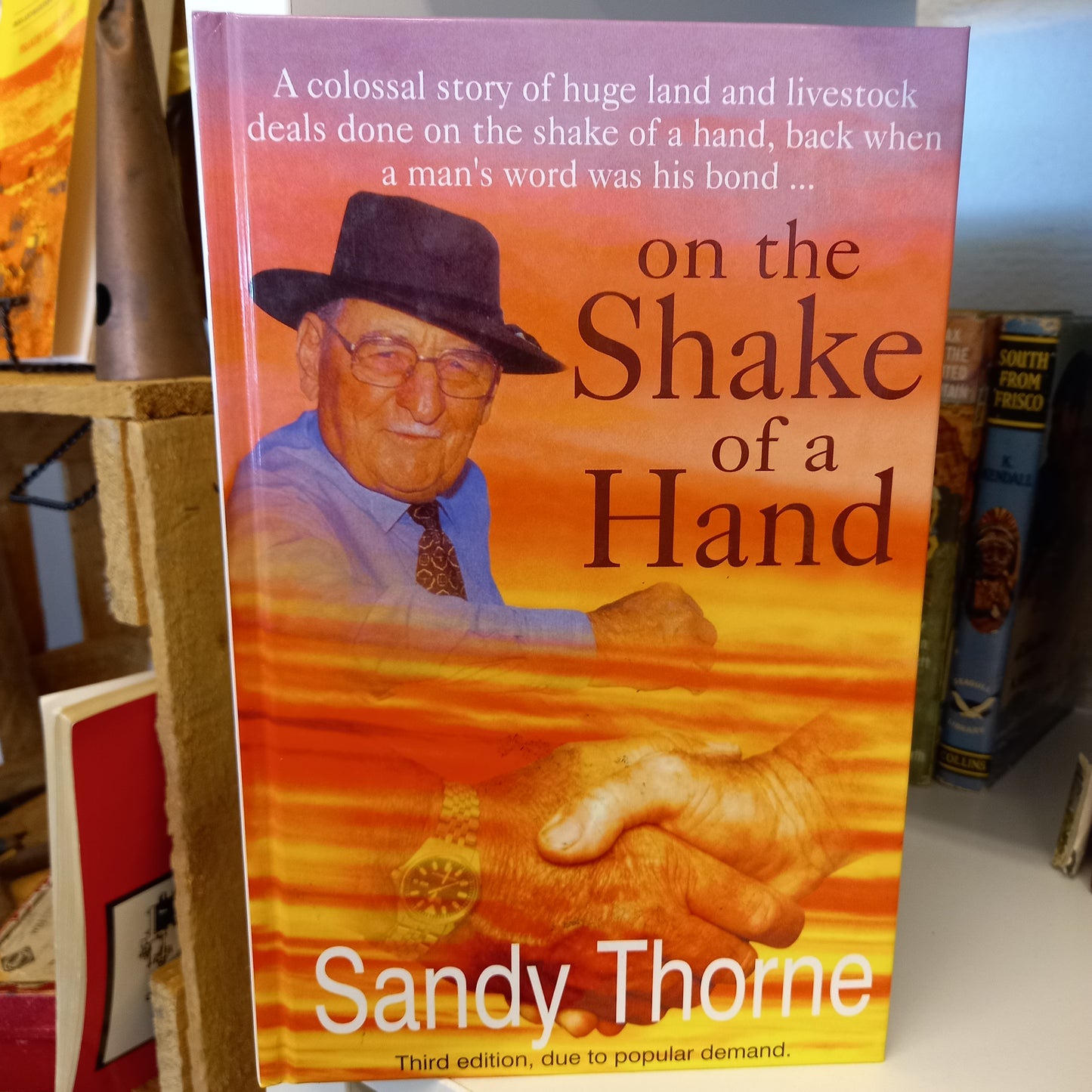 On the shake of a hand by Sandy Thorne-Book-Tilbrook and Co