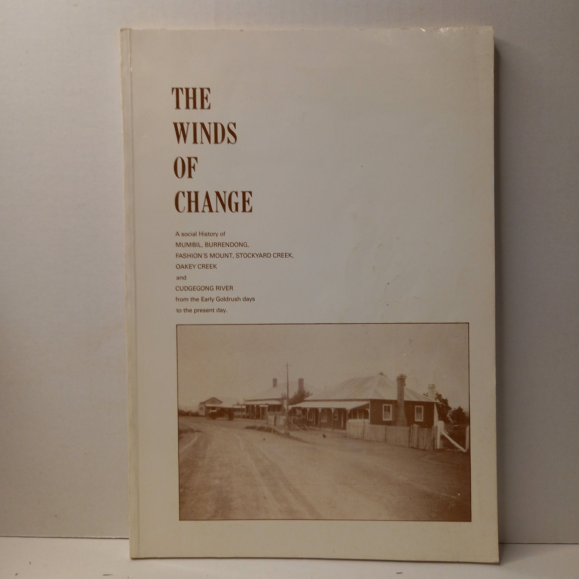 The Winds of Change. A social history of Mumbil, Burrendong, Fashion's Mount, Stockyard Creek. Oakey Creek and Cudgegong River from the Early Goldrush days to the present day. By B Hansford-Book-Tilbrook and Co