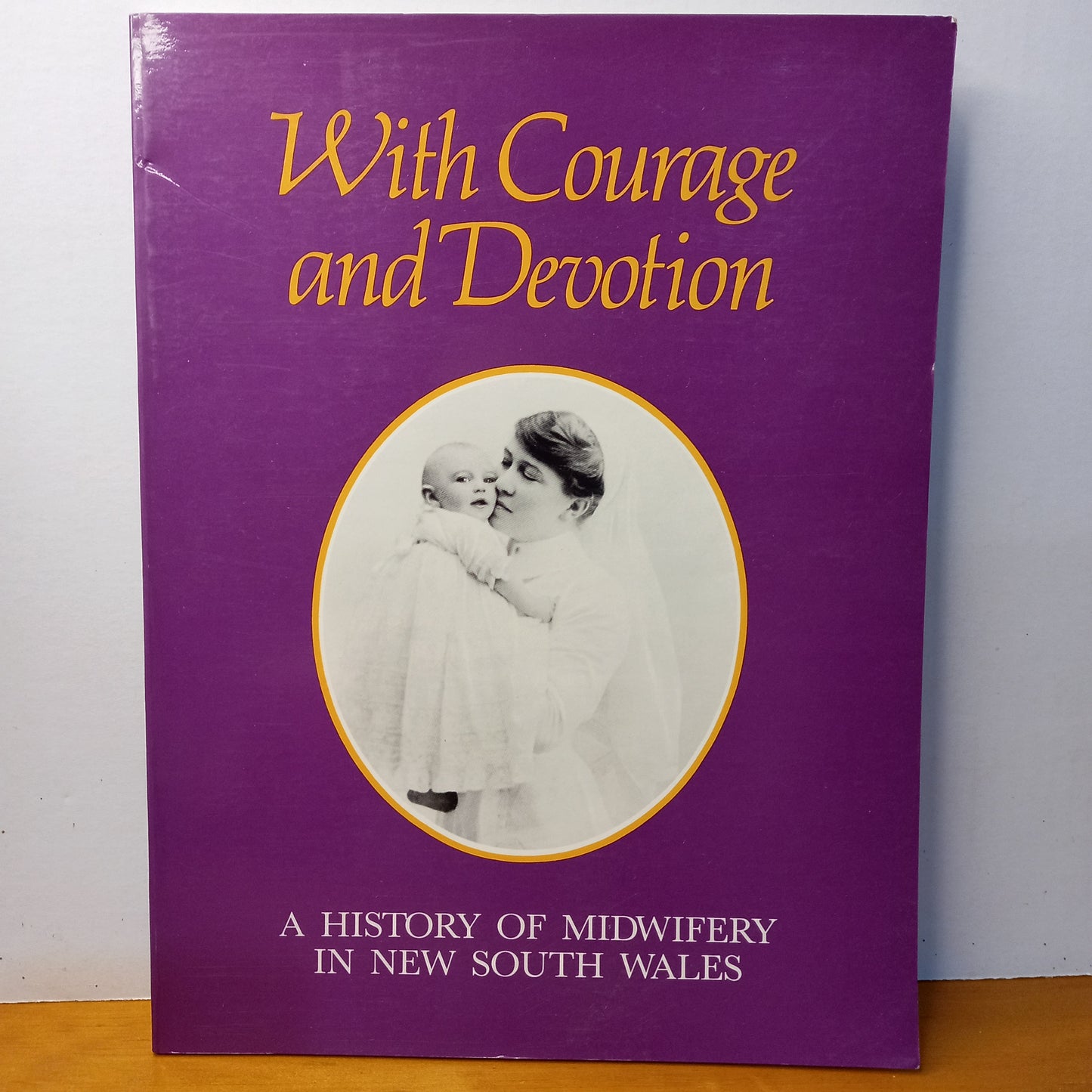 With courage & devotion: A history of midwifery in New South Wales by Winifred Adcock Et Al-Book-Tilbrook and Co