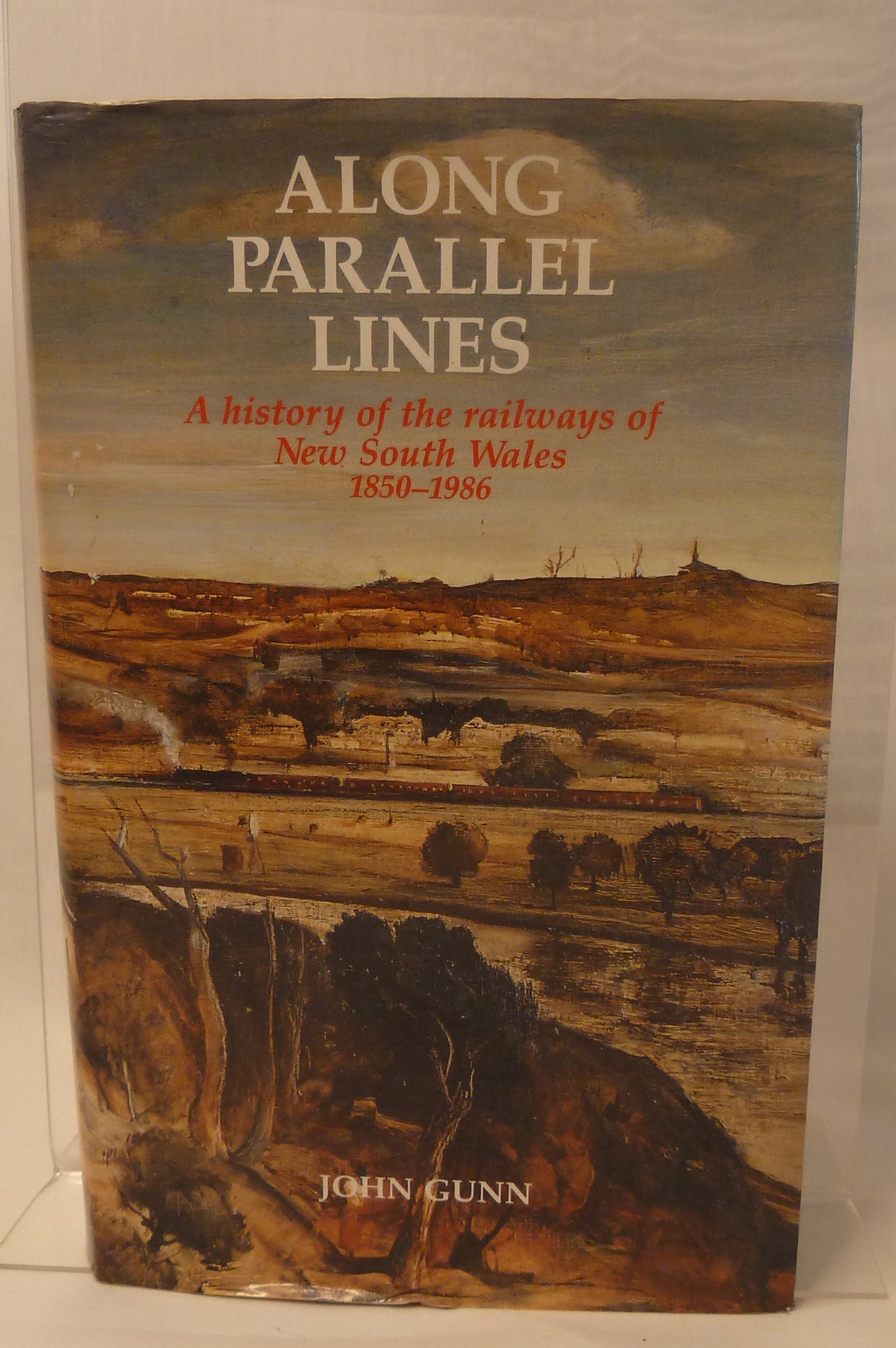 Along parallel lines : a history of the railways of New South Wales by John Gunn-Book-Tilbrook and Co